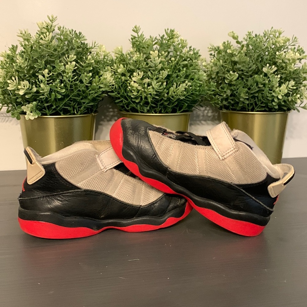 Nike Jordan size 10 toddler black and red.